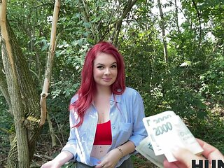 A pale girl with red hair is fucking with her instructor outdoors