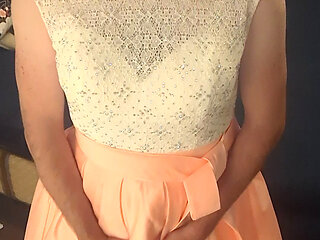 Enjoying a cuteute pink satin prom dress in bed
