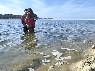 Mature MILF with big natural tits enjoys sex under the water