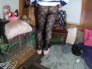 Cute t-girl teasing in lacy tights with socks and hockey jersey