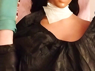 Ebony sex doll Nikki wears barberette capes