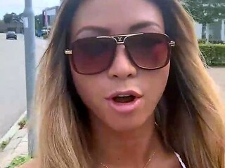 Blonde is flashing her big boobs in the outdoors