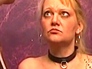 Tattooed Blonde MILF Endures Dungeon Spanking Session