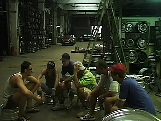 Pretty German whore takes on giant cocks in a hard warehouse gangbang