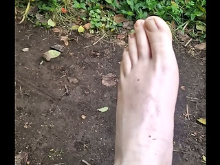 Feet Boy in garden lodge