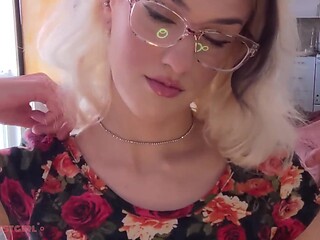Sexy brunette in glasses seductively makes eye contact