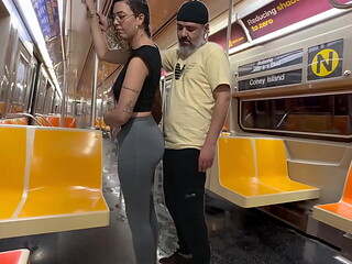 Student girl gets cum on New York subway train.