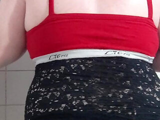 Secretary waiting for the boss in a thread thong and a wet bodice in the bathroom