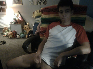 Cute boy makes himself feel good on webcam