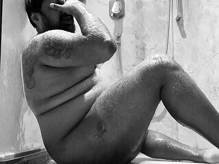 Young bear masturbates while showering