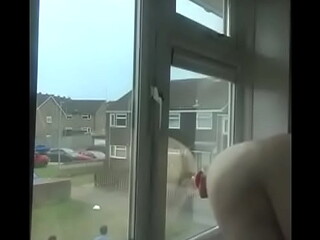 dildo gets fucked stuck on the window from two different angles as people walk by in one video with the one vote wanker