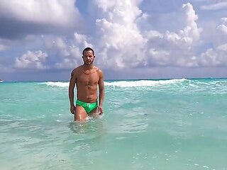 Masturbating in front of the cameraman and sucking him too