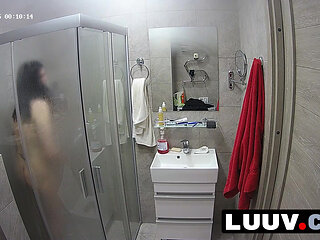 LUUV. A brunette showers, used to amateur cameras, showing her natural body