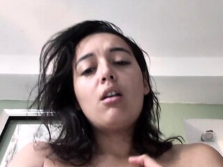 Busty curly brunette with big boobs fucks on couch
