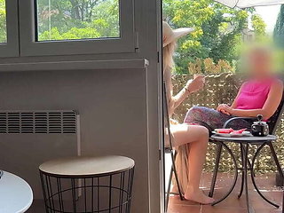 My Husband Jerks Off and Cums in Front of My Step-Mom While We Chat on the Balcony