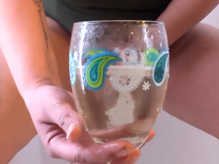 Desperate piss in a wine glass