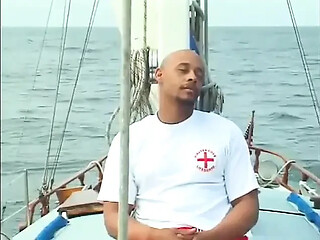 Two hot black babes enjoy some fun in the sun on a luxurious yacht