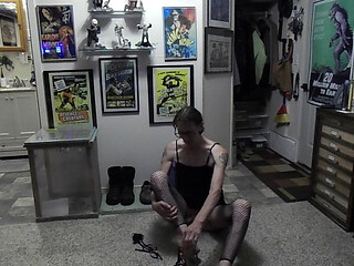 foot covers, fishnet stockings and satin camisole