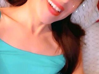 Beautiful redhead uses toy to masturbate