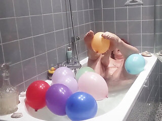 Taking a Bath and Playing with Balloons