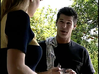 An older woman talks to her partner in a bra at home 2 scenes in 1