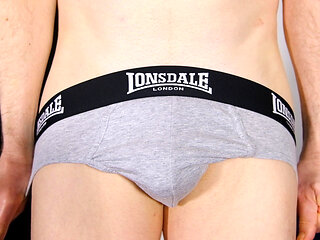 Close up underpants show flaccid shaved uncut penis and foreskin for everyone to see