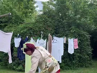 Dressed in a little dress to pick up the laundry
