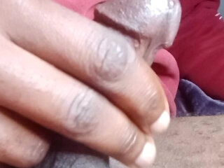 Masturbating