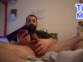 Lextalon jerks off on bed looking at the phone - powerful cumshot