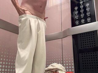 Naked elevator ride in shopping mall