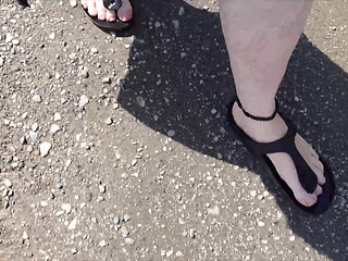 Outdoor in a Black Caftan and Barefoot in Black Birkenstocks