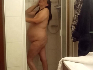 Hot shower, big curves and a lot of femininity...