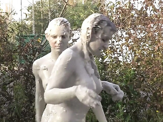 Exhausted female cop gets dirty with rival in muddy yard