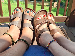 Showing off our feet and sandals with toe rings and anklets