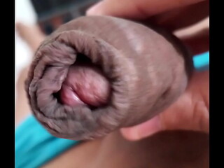 Growing penis, from soft to hard, displaying my uncircumcised cock, closeup. November 30, 2024.