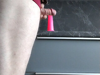 Riding dildo on kitchen table