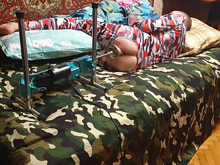 Sasha Earth in an erotic costume having sex with a fuck machine homemade