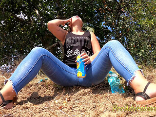 Chubby girl talking on the phone with her boy friend pee in her jeans