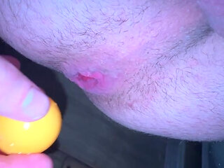 A young boy asks himself for tennis balls