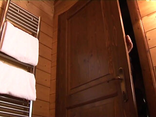 Naughty and naked woman banged by a younger boy in a chalet