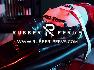 Hottest rubber clinic babe plays with her gas mask toy