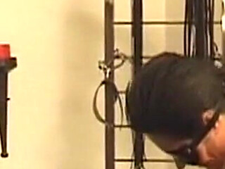 Mature Brunette Submissive Gets Clamped and Crop Spanked