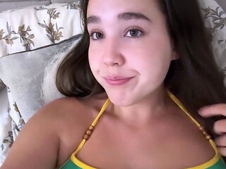 Busty babe playing with her big boobs