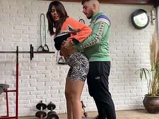 Coach stops exercising and instead stretches her craving pussy