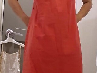 Cute petite milf tries on sexy clothes in public fitting room
