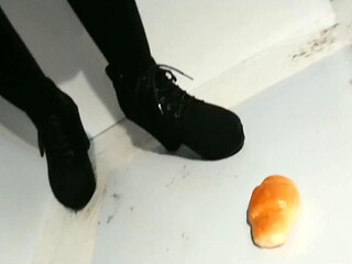 Slender Japanese crushes your boots and shows off her feet