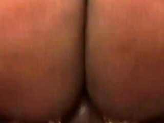 The cougar is a dark skinned slut with huge breasts and shaggy pussy giving her pussy to a hard cock