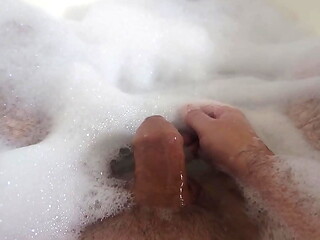 I masturbate myself while taking a bubble bath