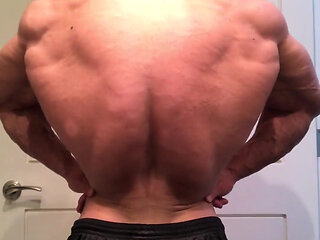 Jacked Bodybuilder Benji Bastian Flexing His Huge, Shredded, Muscles