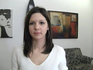 Sweet brunette teen is toying and fingering her shaved pussy